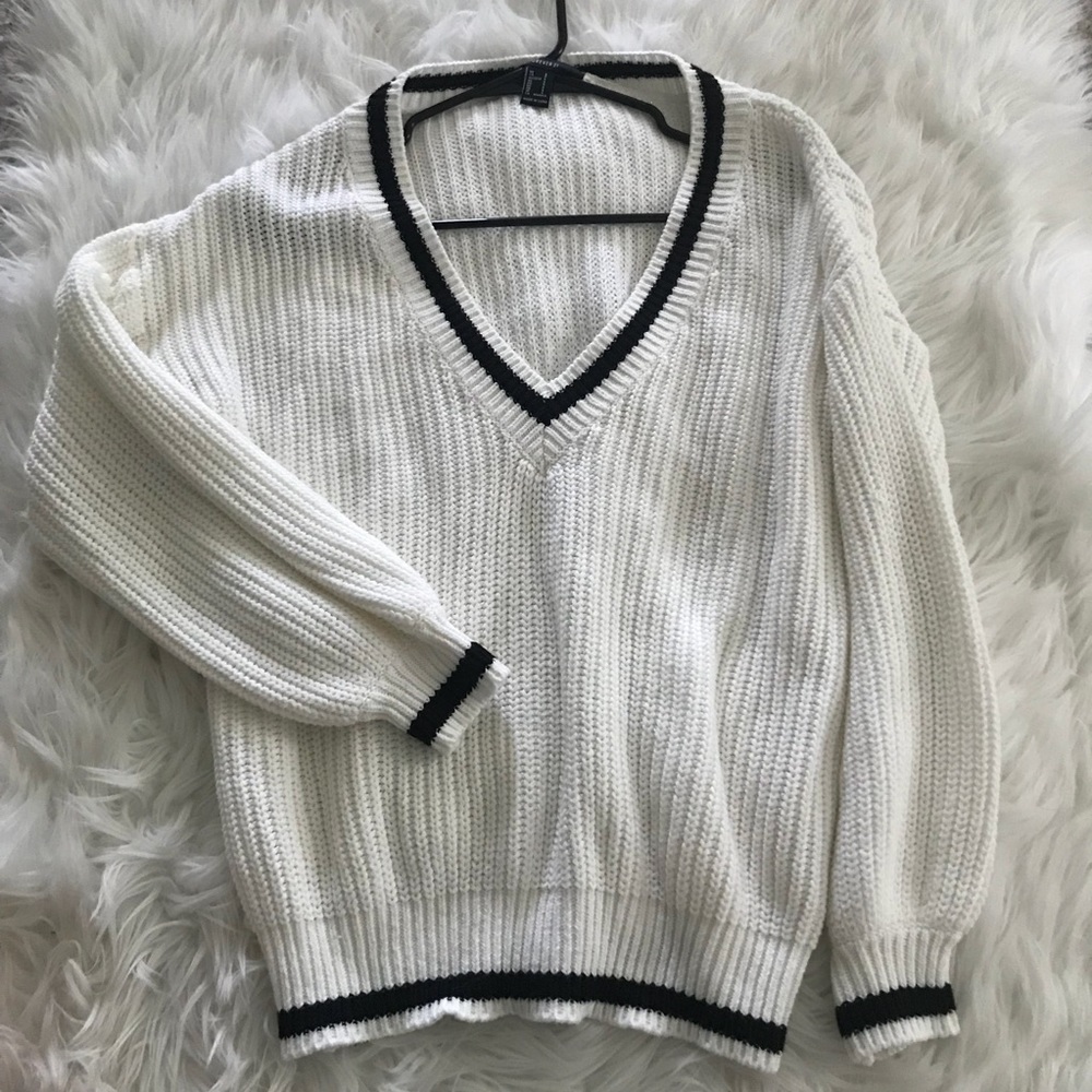White and black sweater